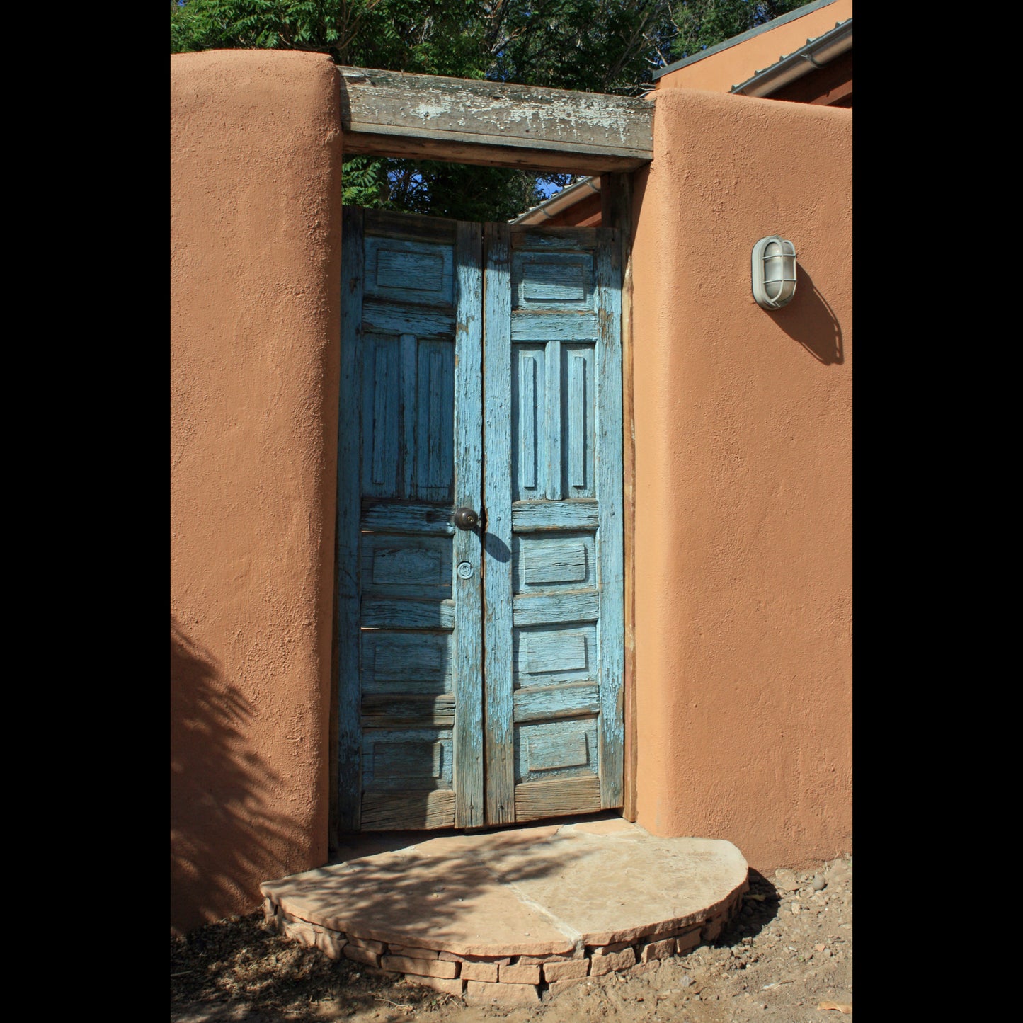 Photo of a light blue double door