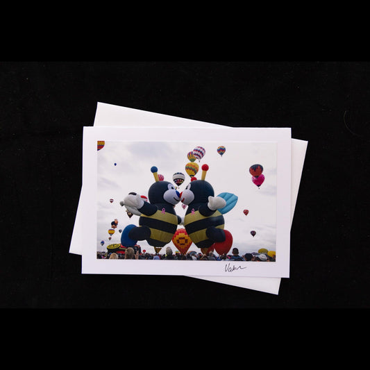 Photo notecard of bee hot air balloons kissing at the Albuquerque Balloon Fiesta