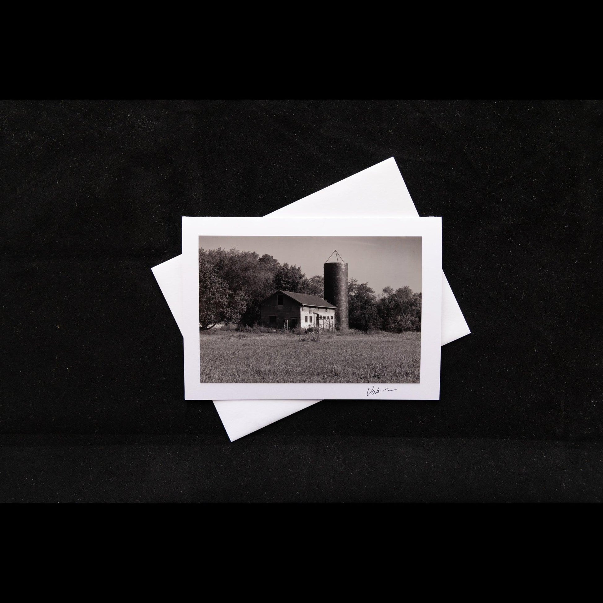 Black and white photo notecard of old buildings in Kansas