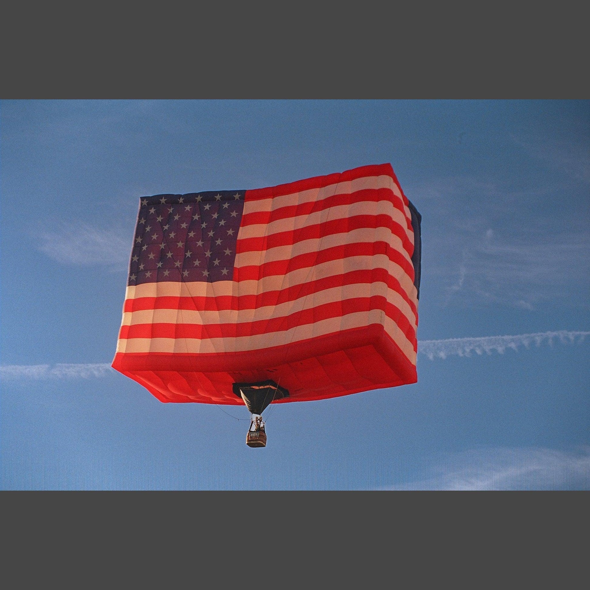 A hot air balloon shaped like a flag